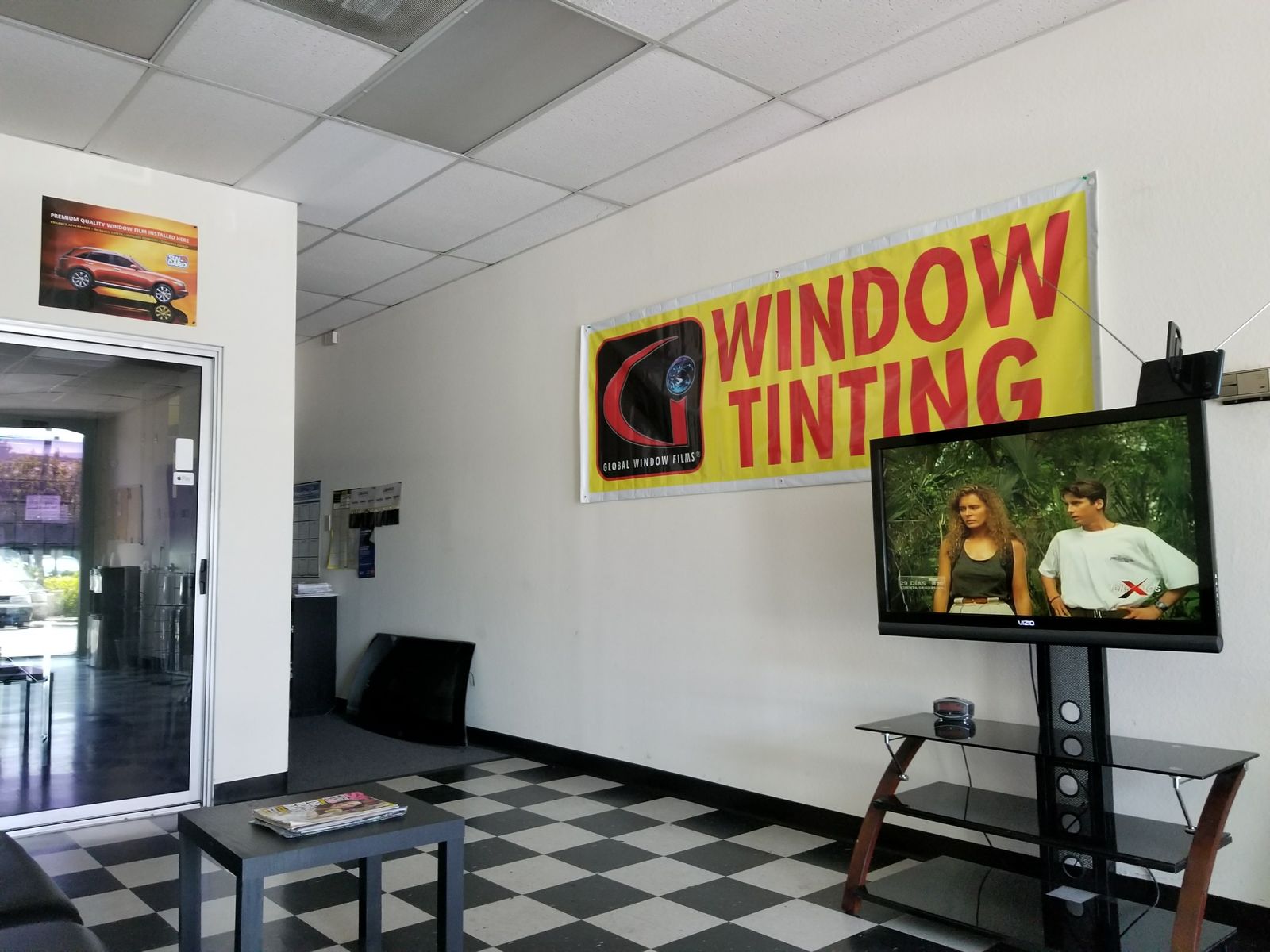 Customer waiting room with the Window Tinting sign